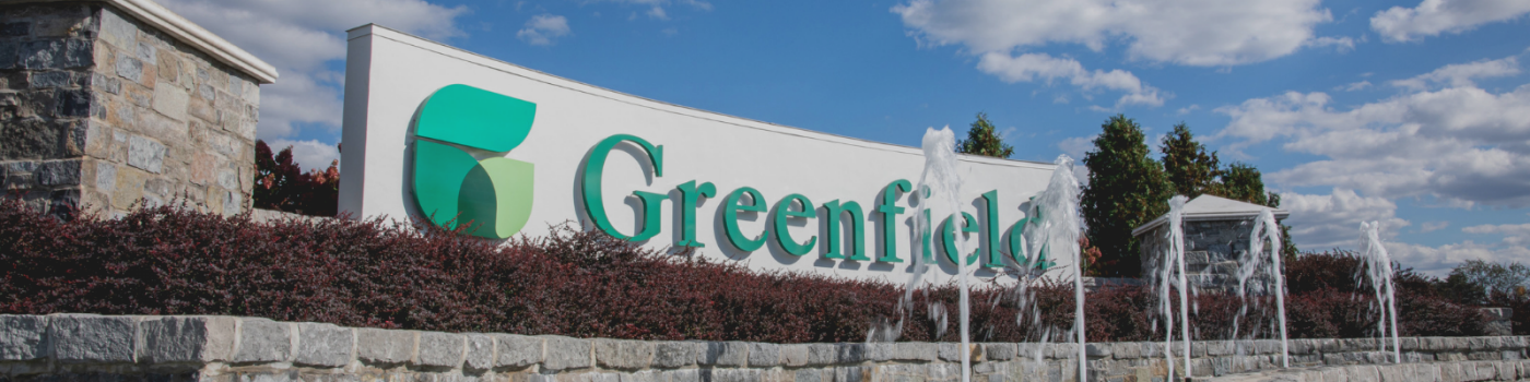 Greenfield entrance sign and water fountain 